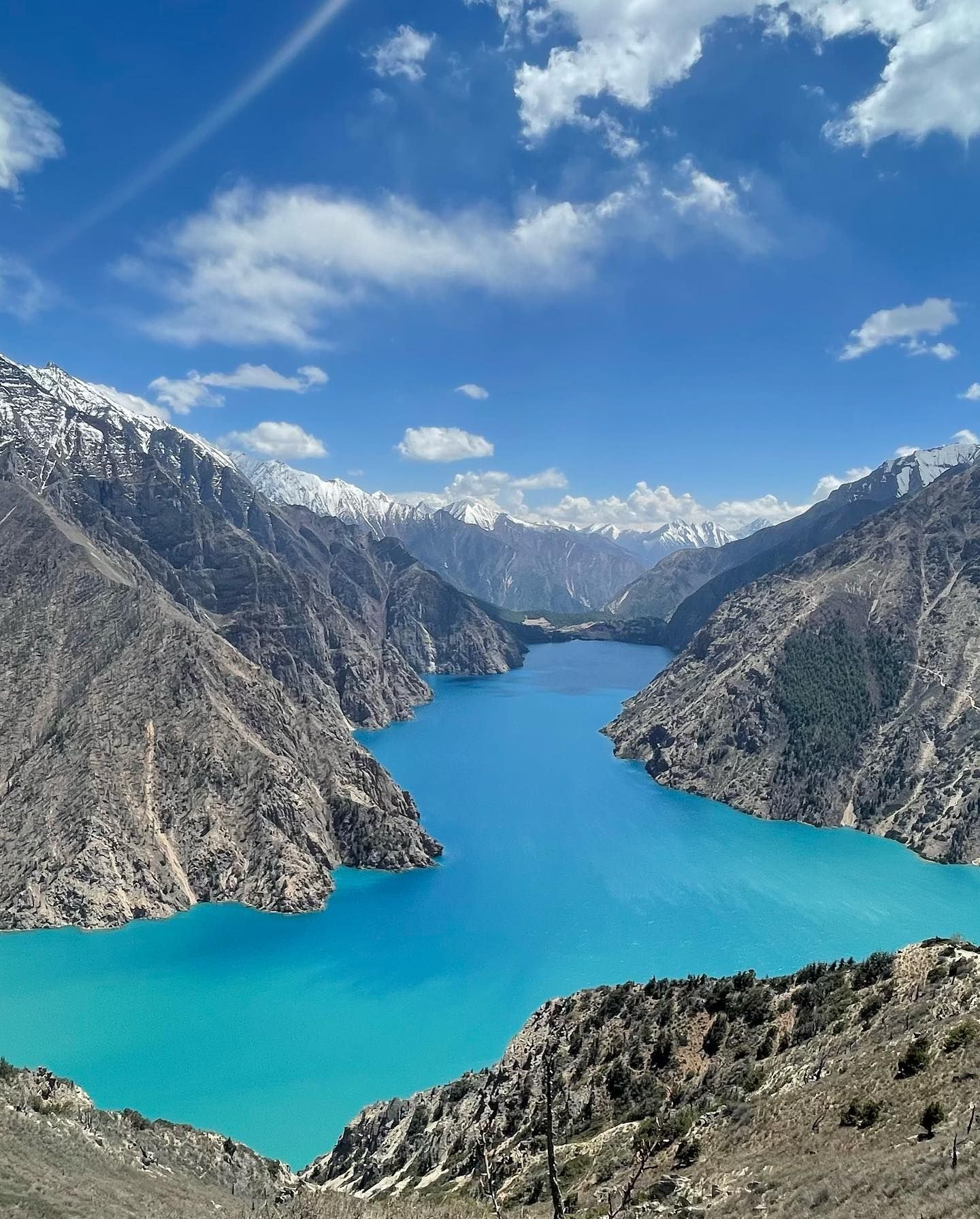 Long portrait view of shey phoksundo lake